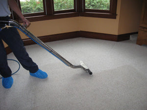 What Is The Easiest Way To Clean A Carpet Using A Vacuum Cleaner?