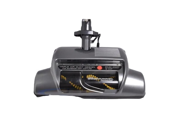 A vintage silver and black window vacuum cleaner head with a visible 'WINDTUNNEL' label and yellow striped brush bar, photographed against a light gray background.
