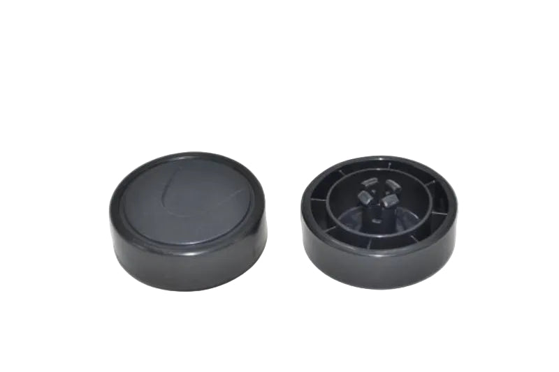 Two black plastic circular components, one showing a smooth outer surface and the other showing a textured inner hub, on a plain light background.