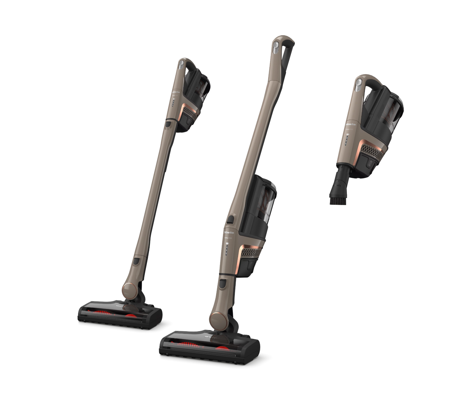 Three different attachments of a vacuum cleaner on a white background