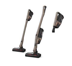 Three different attachments of a vacuum cleaner on a white background